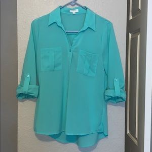 Teal button down shirt